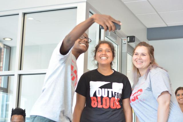 three students take a selfie